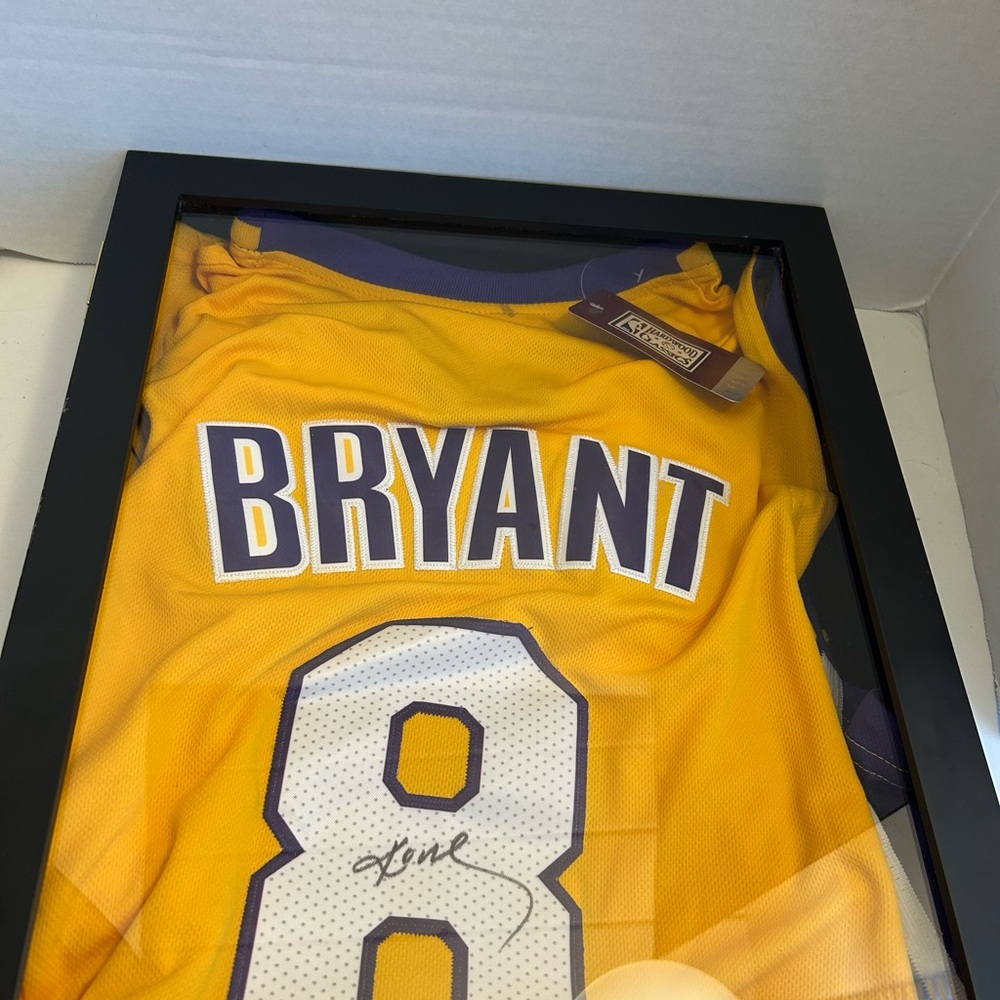 Framed Kobe Bryant Jersey Autograph in Yellow and Purple